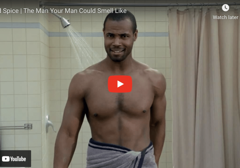 a man standing in a shower for Old Spice commercial